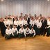 Vorschau: Die Servicekräfte mit Politikern beim 65. Defftig Ollnborger Gröönkohl-Äten. Foto: Torsten von Reeken