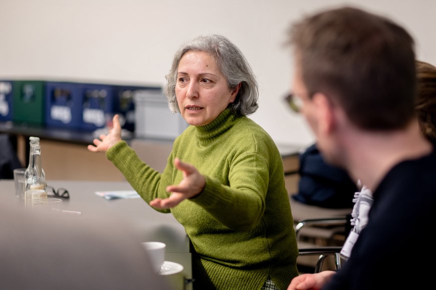 Teilnehmende diskutieren bei der Veranstaltung. Foto: Hauke-Christian Dittrich
