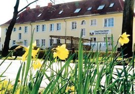 GWA Dietrichfeld hinter Blumen. Foto: Stadt Oldenburg