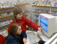 Two girls using an internet work station at the Oldenburg Library. Picture: Peter Kreier