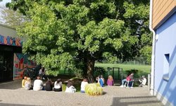 Kinder im Garten der Freizeitstätte Kreyenbrück. Foto: Stadt Oldenburg