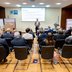 Vorschau: Teilnehmende der Veranstaltung hören einen Vortrag. Foto: Hauke-Christian Dittrich