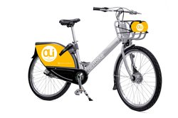 Fahrrad des Fahrradverleihsystems OLi-Bike mit orangenem Logo am Radschutz am Hinterrad sowie am Korb. Foto: Bremer Tageszeitungen AG