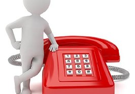 Figur mit rotem Telefon. Foto: fotomek/Fotolia