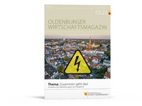 Die Titelseite des „Oldenburger Wirtschaftsmagazin 3.22“ zeigt eine Luftaufnahme der Oldenburger Innenstadt mit Blickrichtung Hafen sowie ein gelbes Dreieck mit schwarzem Blitz als Symbol für die Energiekrise. Foto: Markus Löchte