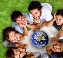 Young people sitting around a model of the planet. Picture: Andres Rodriguez/Fotolia.com